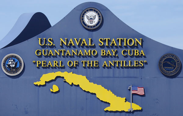 The main sign at the U.S. Naval Station at Guantanamo Bay, Cuba March 5, 2013. REUTERS/Bob Strong (CUBA)